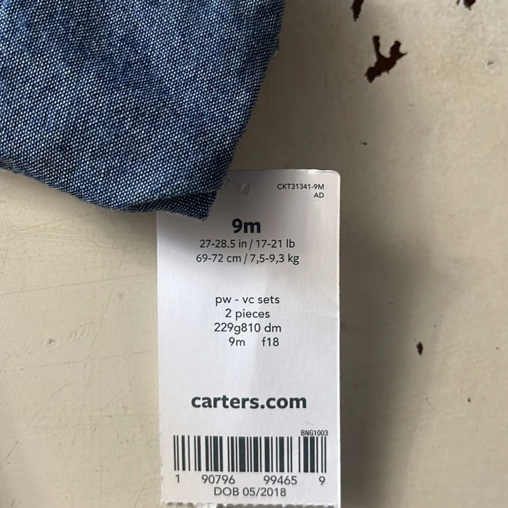 Carter’s boys button up shirt. Size 9 months. New!